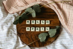 close up shot of scrabble tiles on a wooden tray